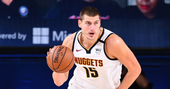 Basketball player Nicola Jokic with a ball in possesion during a game